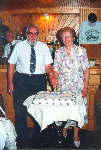 Jim & Ginny Cutting the Anniversary Cake
